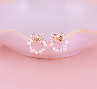 Aretes perlas moños
