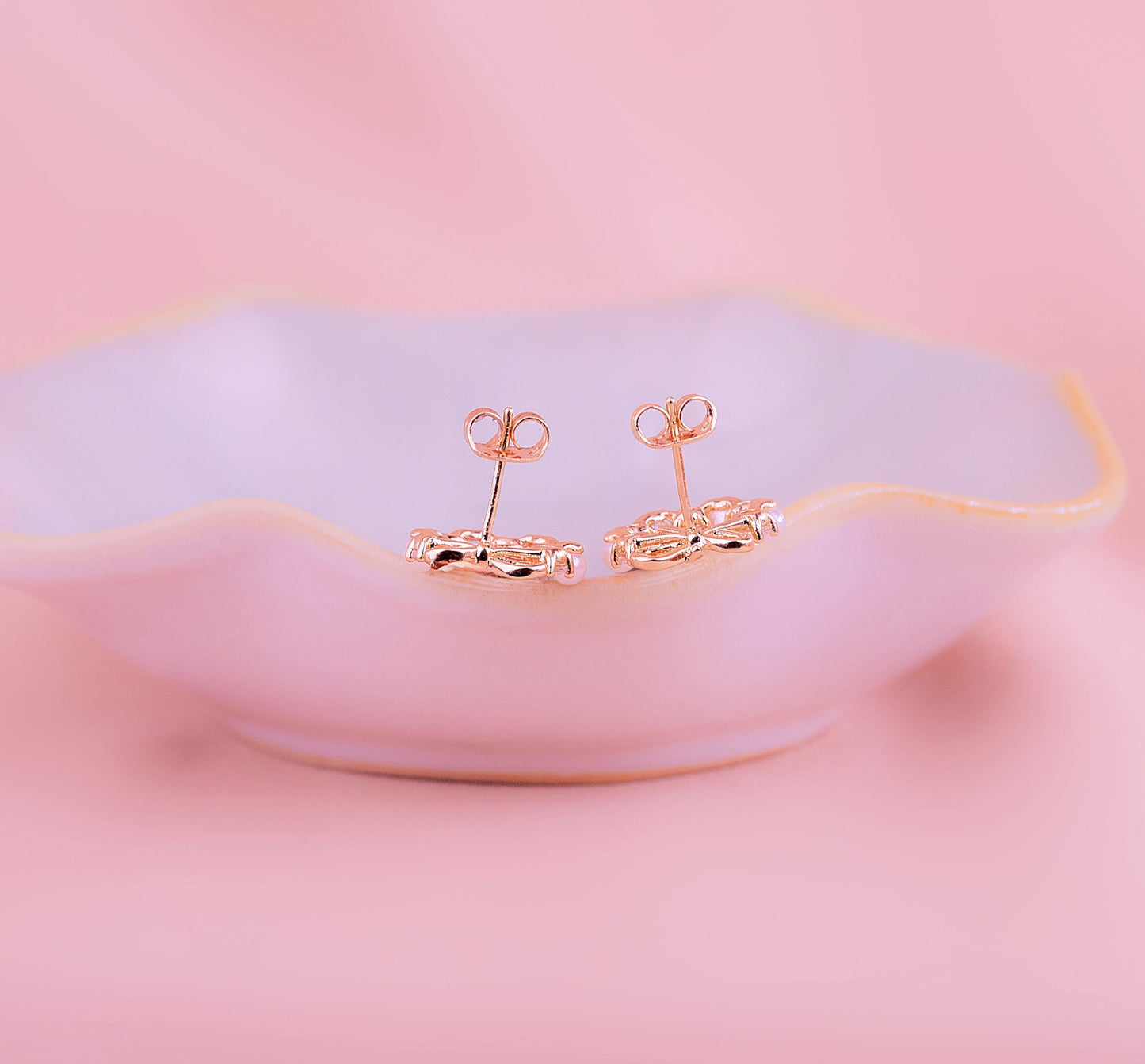Aretes perlas moños
